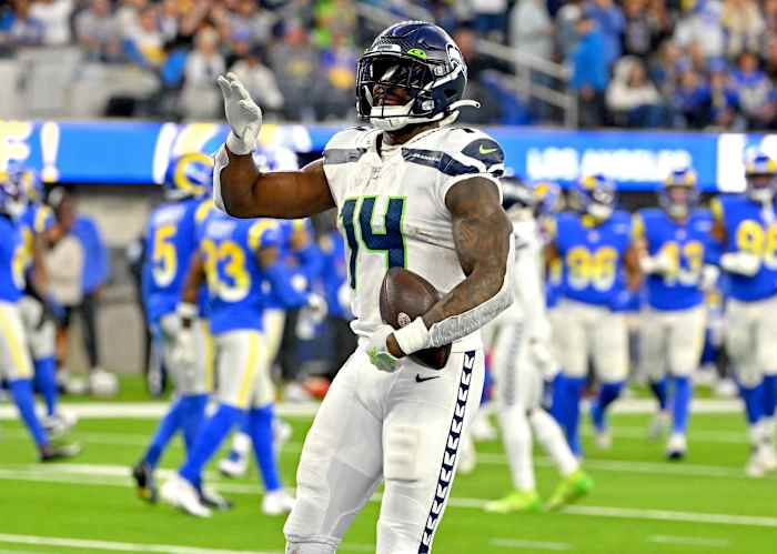 Seattle Seahawks wide receiver DK Metcalf (14) celebrates after a touchdown in the fourth quarter against the Los Angeles Rams at SoFi Stadium.